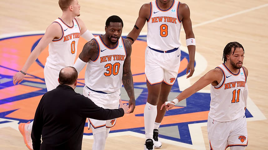 New York Knicks head coach Tom Thibodeau high fives New York Knicks forward Julius Randle (30) with guard Donte DiVincenzo (0) and forward OG Anunoby (8) and guard Jalen Brunson (11) during the first quarter against the Washington Wizards at Madison Square Garden