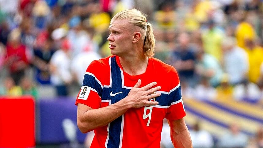 Erling Haaland stands for Norway after scoring during the World Cup against Brazil