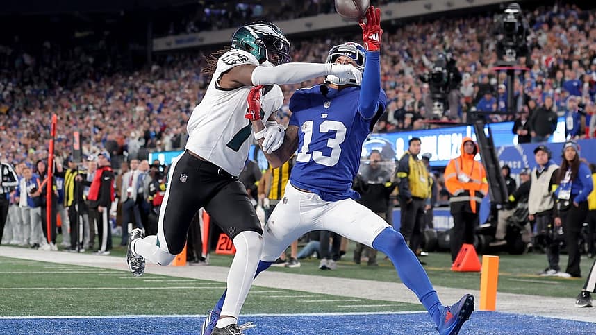 Jalin Hyatt reaching for a pass in the end zone during a Giants game