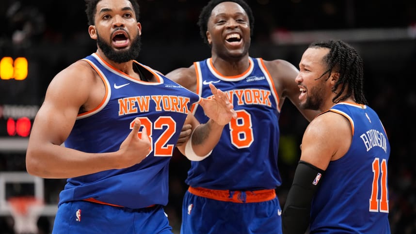 Dec 9, 2024; Toronto, Ontario, CAN; New York Knicks guard Jalen Brunson (11) and forward OG Anunoby (8) react after a three point basket by center Karl-Anthony Towns (32) to clinch a win over the Toronto Raptors during the second half at Scotiabank Arena. Mandatory Credit: John E. Sokolowski-Imagn Images