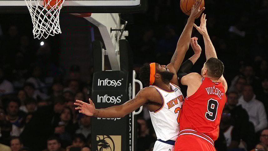 Knicks, Mitchell Robinson Chicago Bulls center Nikola Vucevic (9) shoots against New York Knicks center Mitchell Robinson (23) during the first half at Madison Square Garden