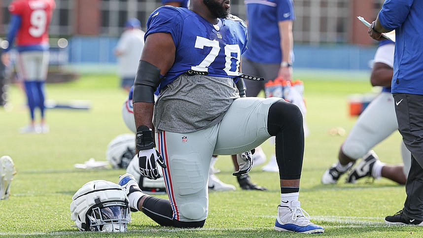 New York Giants offensive tackle Korey Cunningham (70) stretches during training camp at the Quest Diagnostics Training Facility