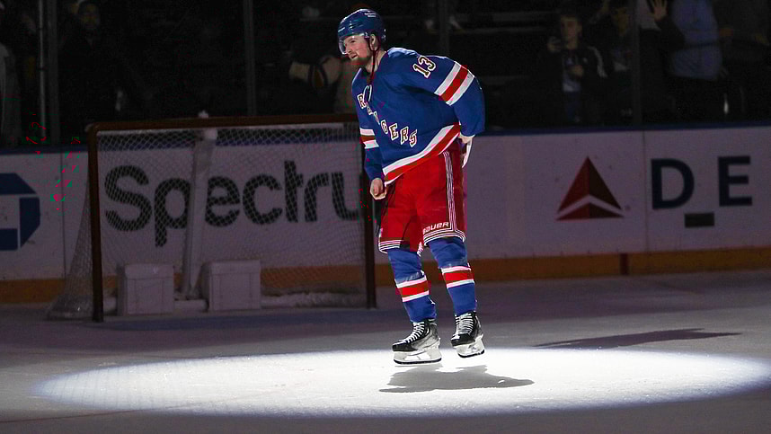 New York Rangers left wing Alexis Lafreniere (13) waves to fans after scoring a game-winning goal in overtime against the Calgary Flames at Madison Square Garden