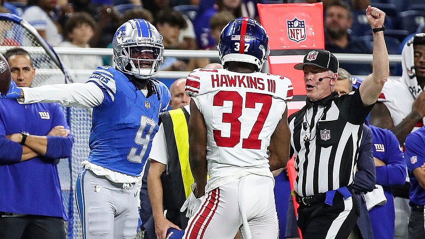 Detroit Lions wide receiver Jameson Williams (9) reacts to a first down catch against New York Giants cornerback Tre Hawkins III (37) during the first half of a preseason game at Ford Field in Detroit on Friday