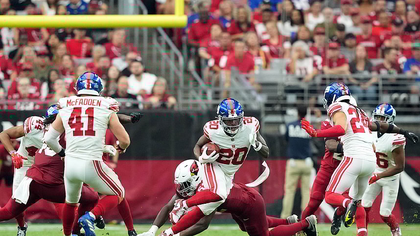 New York Giants running back Eric Gray (20) runs against the Arizona Cardinals during the second half at State Farm Stadium
