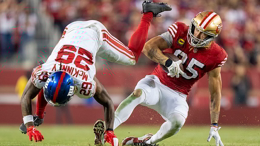 San Francisco 49ers tight end George Kittle (85) is tackled by New York Giants safety Xavier McKinney (29) during the third quarter at Levi's Stadium
