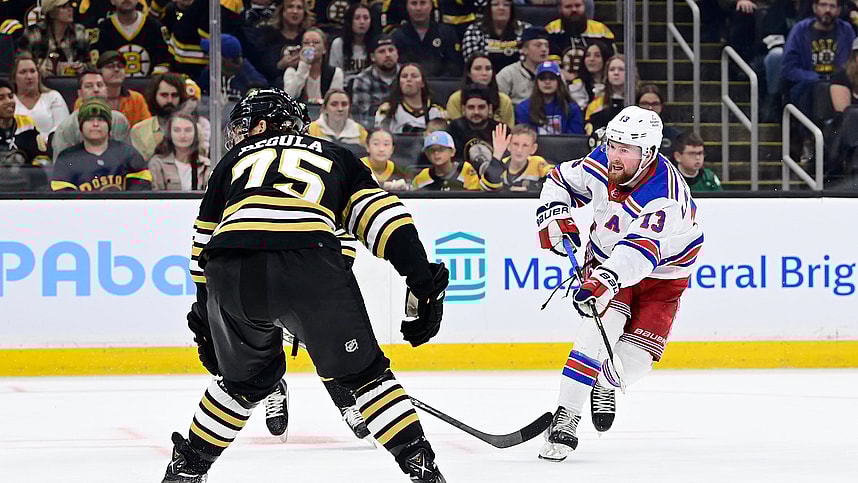 New York Rangers left wing Alexis Lafreniere (13) shoots the puck against the Boston Bruins during the second period at TD Garden