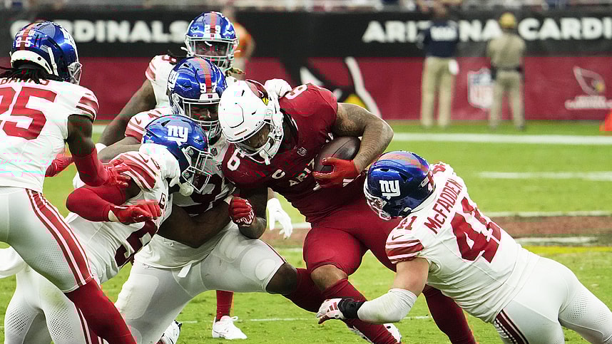 Arizona Cardinals running back James Conner (6) is tackled by New York Giants linebacker Micah McFadden (41) in the fourth quarter at State Farm Stadium in Glendale