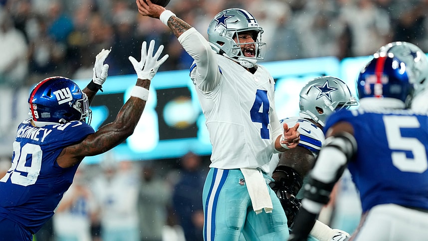 Dallas Cowboys quarterback Dak Prescott (4) throws a pass before New York Giants safety Xavier McKinney (29) can reach him