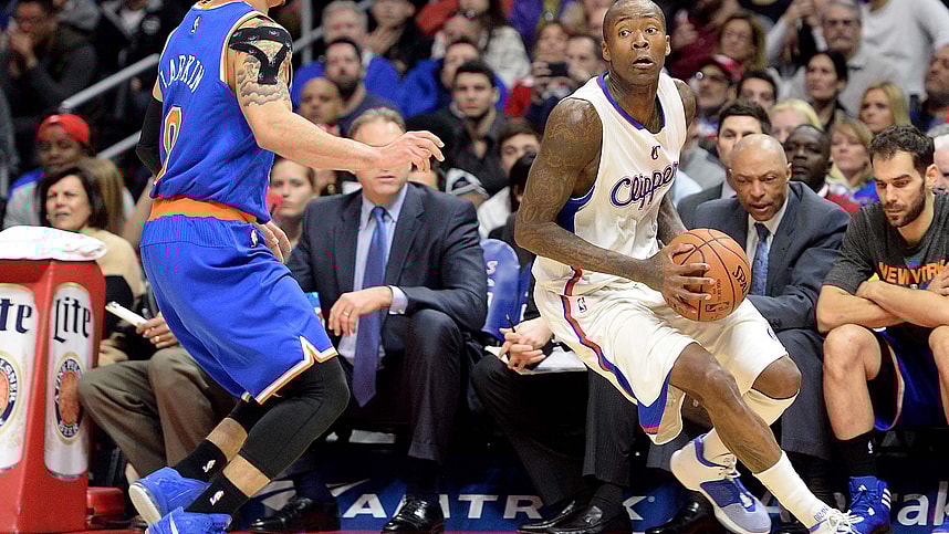 New York Knicks guard Shane Larkin (0) guards Los Angeles Clippers guard Jamal Crawford (11) in the second half of the game at Staples Center