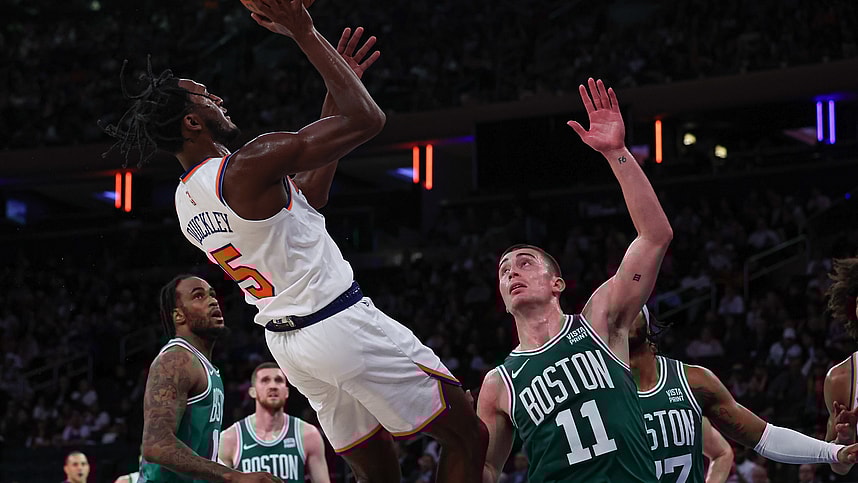 New York Knicks guard Immanuel Quickley (5) shoots the ball as Boston Celtics guard Payton Pritchard (11) defends during the second half at Madison Square Garden