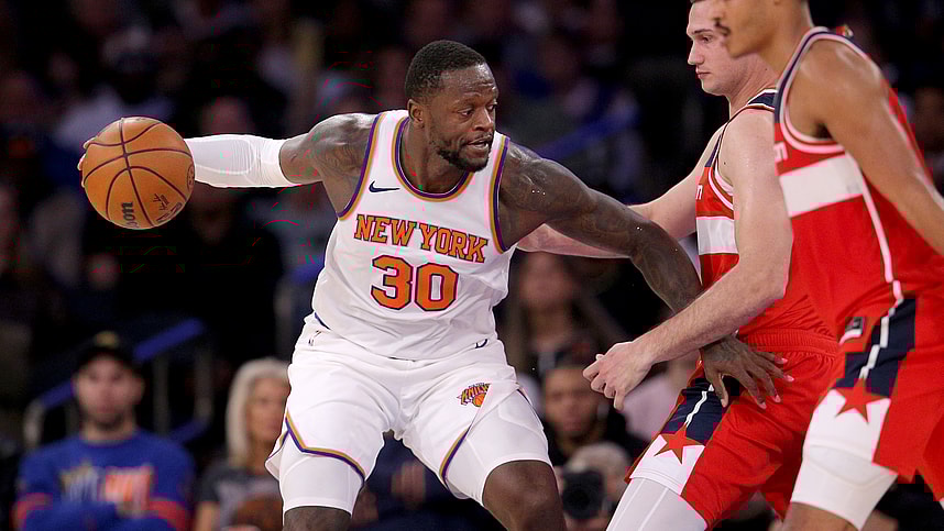 New York Knicks forward Julius Randle (30) controls the ball against Washington Wizards forward Danilo Gallinari (88) and guard Jordan Poole (13) during the third quarter at Madison Square Garden