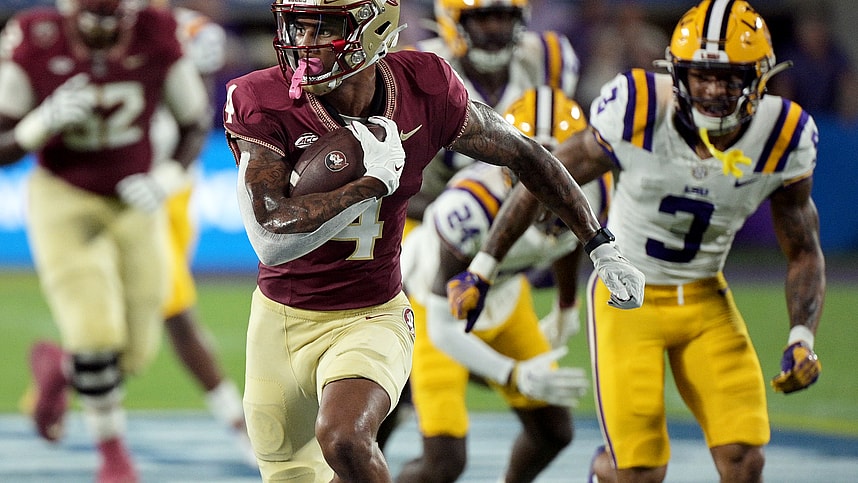 Florida State Seminoles wide receiver Keon Coleman (4) runs the ball for a touchdown during the first half against the Louisiana State Tigers at Camping World Stadium (Giants prospect)