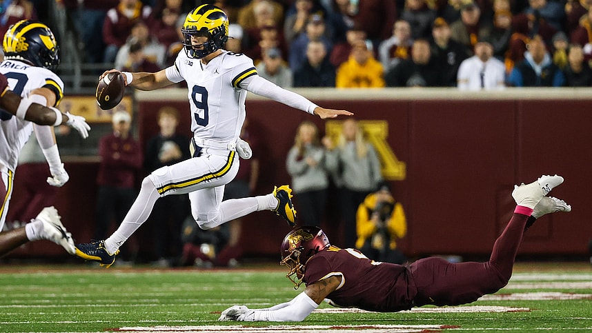 Michigan Wolverines quarterback J.J. McCarthy (New York Giants prospect) (9) runs the ball against the Minnesota Golden Gophers during the first quarter at Huntington Bank Stadium, new york giants