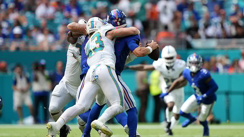 Miami Dolphins linebacker Andrew Van Ginkel (43) sacks Miami Dolphins safety Jevon Holland (8) during the second half at Hard Rock Stadium, New York Giants, Joshua Ezeudu, Daniel Jones