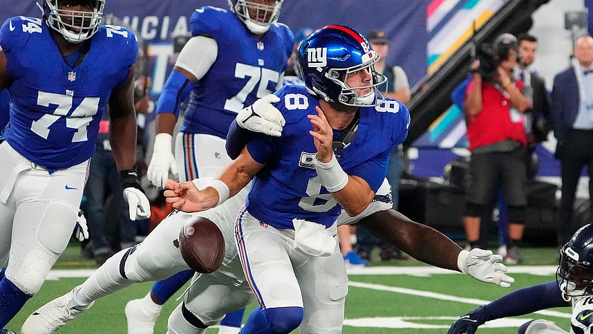 Seattle Seahawks defensive end Mario Edwards Jr. (97) strips the ball from New York Giants quarterback Daniel Jones (8) and the Seahawks recovered at MetLife Stadium