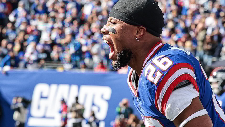 New York Giants running back Saquon Barkley (26) celebrates a Giants touchdown during the first half against the Washington Commanders at MetLife Stadium