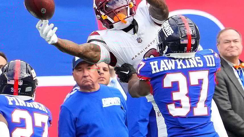 Washington Commanders wide receiver Dyami Brown (2) is unable the catch the ball as New York Giants cornerback Tre Hawkins III (37) defends in the second half at MetLife Stadium