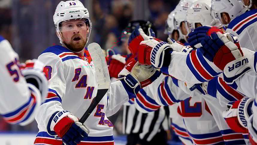 New York Rangers left wing Alexis Lafreniere (13) celebrates his goal with teammates during the first period against the Buffalo Sabres at KeyBank Center