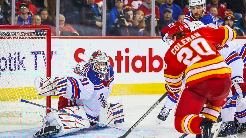 New York Rangers goaltender Igor Shesterkin (31) makes a save against Calgary Flames center Blake Coleman (20) during the second period at Scotiabank Saddledome