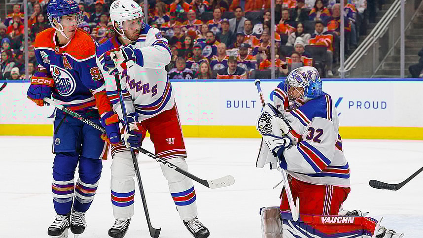 Edmonton Oilers forward Ryan Nugent-Hopkins (93) and New York Rangers defensemen Jacob Trouba (8) battle in front of New York Rangers goaltender Jonathan Quick (32) as he makes a save during the third period at Rogers Place