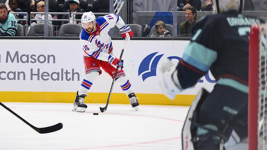 New York Rangers center Vincent Trocheck (16) plays the puck during the second period against the Seattle Kraken at Climate Pledge Arena