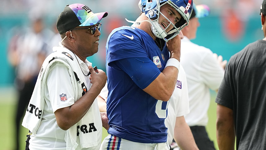 New York Giants quarterback Daniel Jones (8) leaves the game with an injury against the Miami Dolphins during the second half of an NFL game at Hard Rock Stadium in Miami Gardens