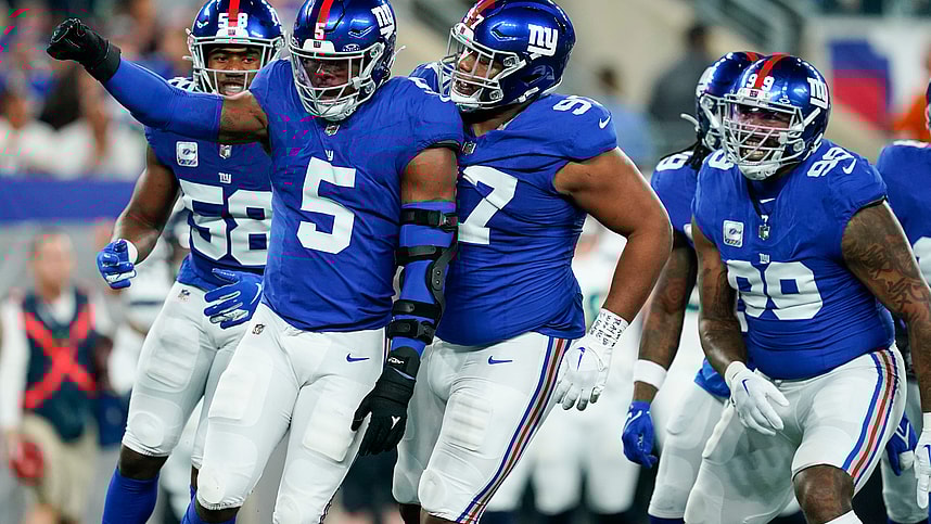 New York Giants linebacker Kayvon Thibodeaux (5) celebrates a sack with the defense in the first half at MetLife Stadium