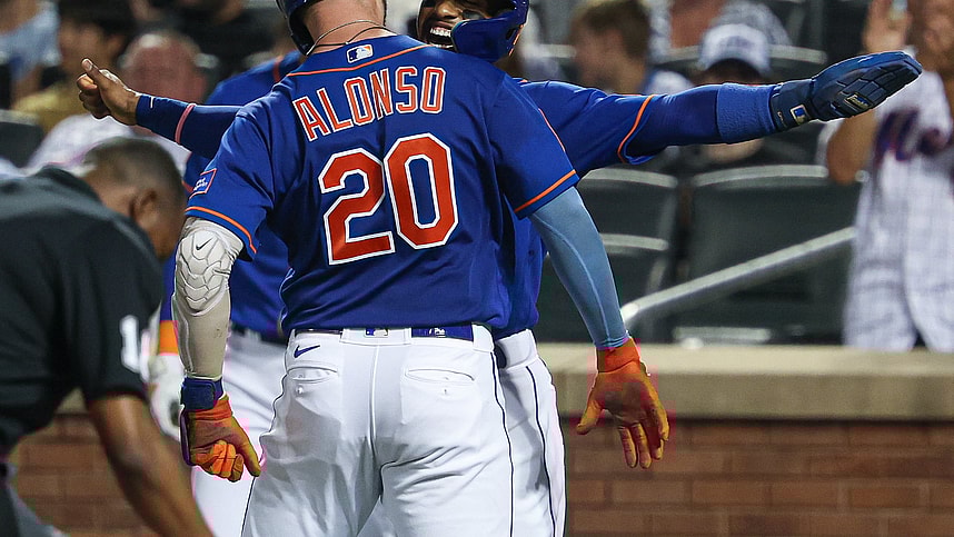 New York Mets first baseman Pete Alonso (20) celebrates with shortstop Francisco Lindor (12) after hitting a two-run home run during the third inning against the Chicago Cubs at Citi Field