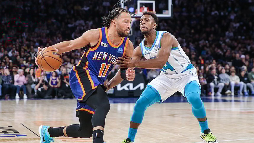 New York Knicks guard Jalen Brunson (11) looks to drive past Charlotte Hornets guard Ish Smith (14) in the second quarter at Madison Square Garden