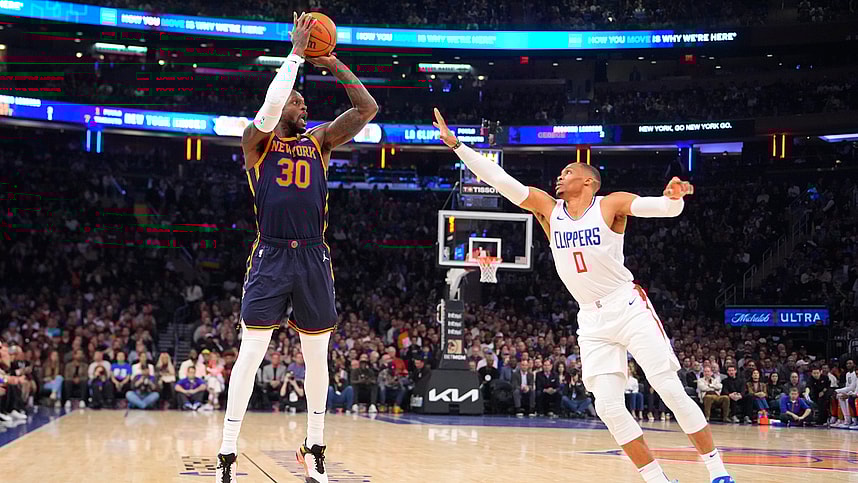 New York Knicks power forward Julius Randle (30) shoots a three point jump shot against Los Angeles Clipper point guard Russell Westbrook (0) during the first quarter at Madison Square Garden