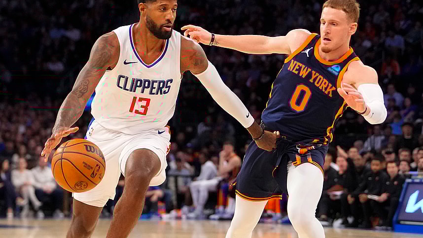 Los Angeles Clipper forward Paul George (13) dribbles the ball against New York Knicks shooting guard Donte DiVincenzo (0) during the fourth quarter at Madison Square Garden