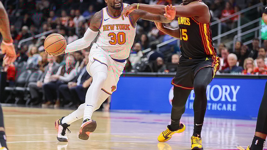 New York Knicks forward Julius Randle (30) drives past Atlanta Hawks center Clint Capela (15) in the first quarter at State Farm Arena
