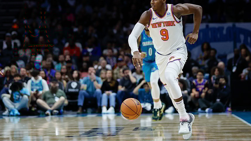 New York Knicks guard RJ Barrett (9) pushes the ball up court against the Charlotte Hornets during the second half at Spectrum Center