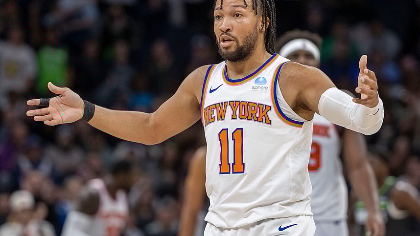 New York Knicks guard Jalen Brunson (11) looks towards the bench after a call on the floor against the Minnesota Timberwolves in the second half at Target Center