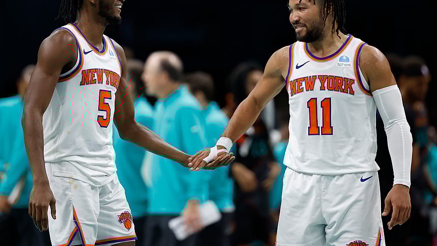New York Knicks guard Immanuel Quickley (5) celebrates with Knicks guard Jalen Brunson (11) against the Washington Wizards in the fourth quarter at Capital One Arena