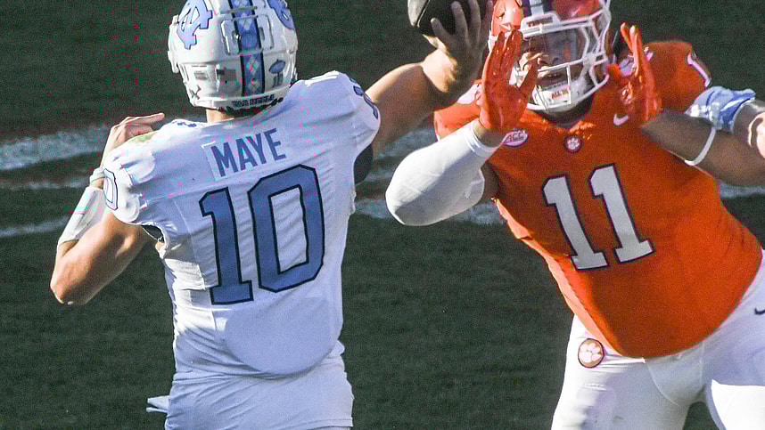 Clemson Tigers defensive lineman Peter Woods (11) pressures North Carolina Tar Heels quarterback Drake Maye (10) during the first quarter at Memorial Stadium (New York Giants)