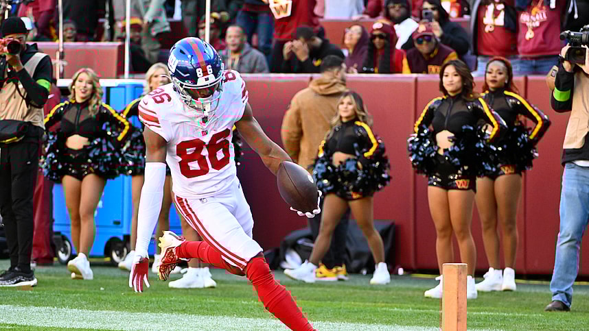 New York Giants wide receiver Darius Slayton (86) scores a touchdown  against the Washington Commanders during the first half at FedExField