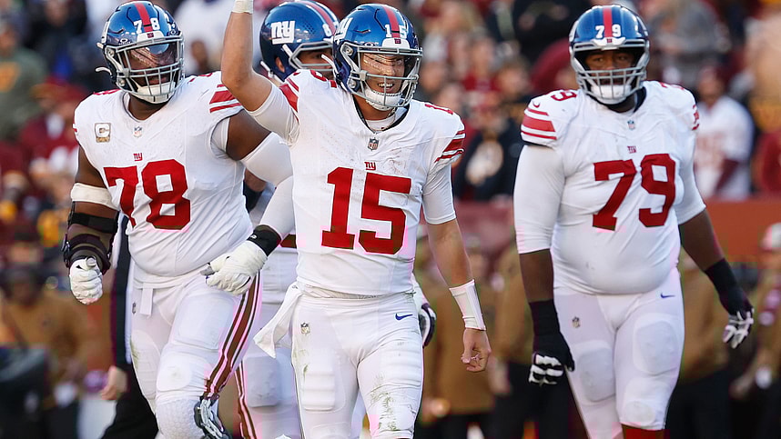 New York Giants quarterback Tommy DeVito (15) celebrates after throwing a touchdown pass against the Washington Commanders during the second quarter at FedExField