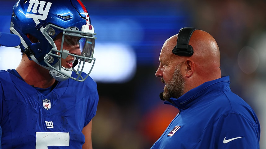 New York Giants head coach Brian Daboll speaks with quarterback Tommy DeVito (5) during the second half of their game against the New York Jets at MetLife Stadium