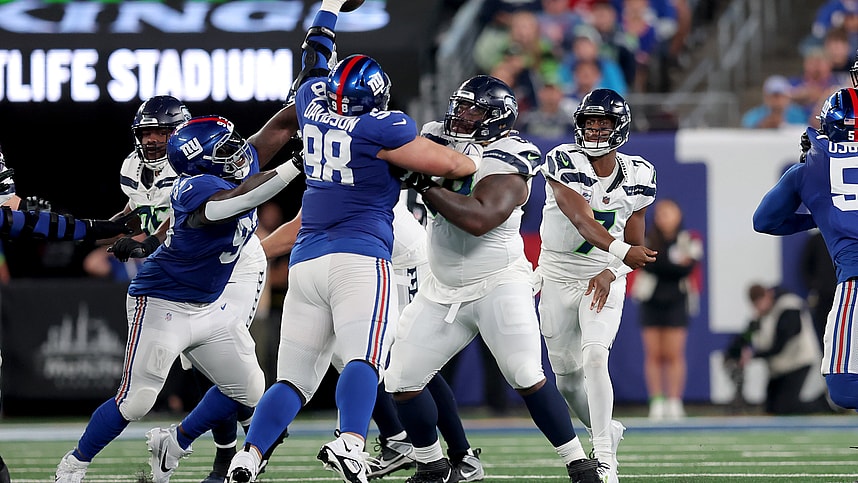 New York Giants defensive tackle D.J. Davidson (98) blocks a pass by Seattle Seahawks quarterback Geno Smith (7) during the second quarter at MetLife Stadium