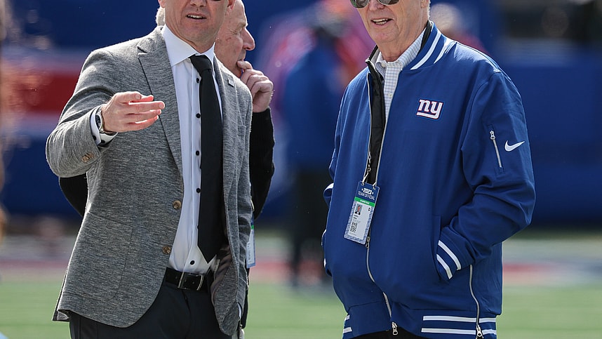 New York Giants general manager Joe Schoen (left) talks with with president and CEO John Mara (right) before the game against the Washington Commanders at MetLife Stadium