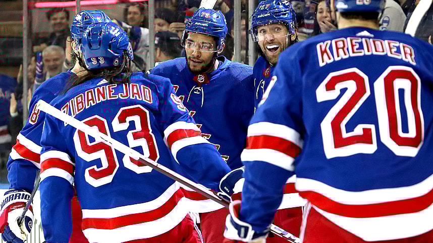 New York Rangers defenseman K'Andre Miller (79) celebrates his goal with center Mika Zibanejad (93), right wing Blake Wheeler (17) and left wing Chris Kreider (20) during the second period against the Boston Bruins at Madison Square Garden