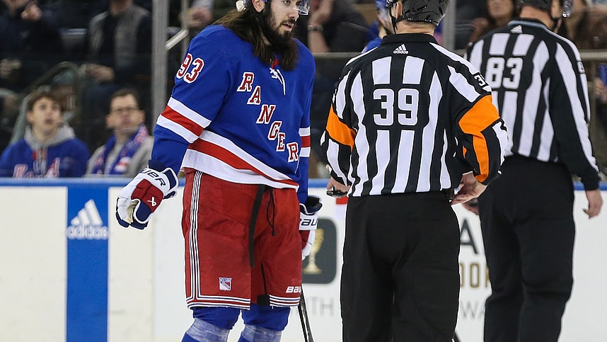New York Rangers center Mika Zibanejad (93) argues with referee Brandon Blandina (39) in the first period against the Columbus Blue Jackets at Madison Square Garden