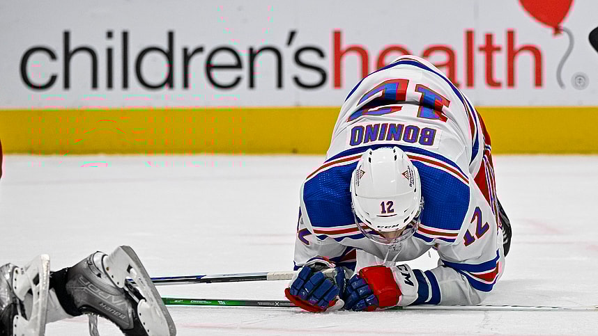 New York Rangers center Nick Bonino (12) falls to the ice during the third period against the Dallas Stars at the American Airlines Center