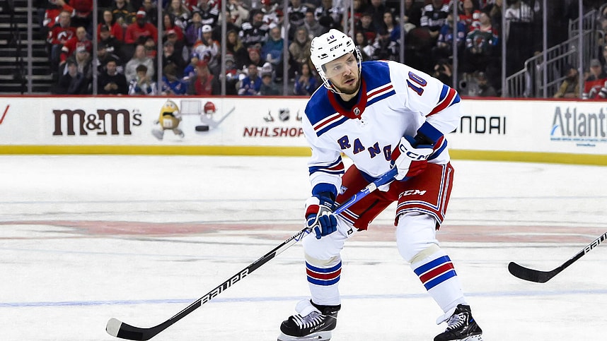 New York Rangers left wing Artemi Panarin (10) looks to pass the puck against the New Jersey Devils during the first period at Prudential Center