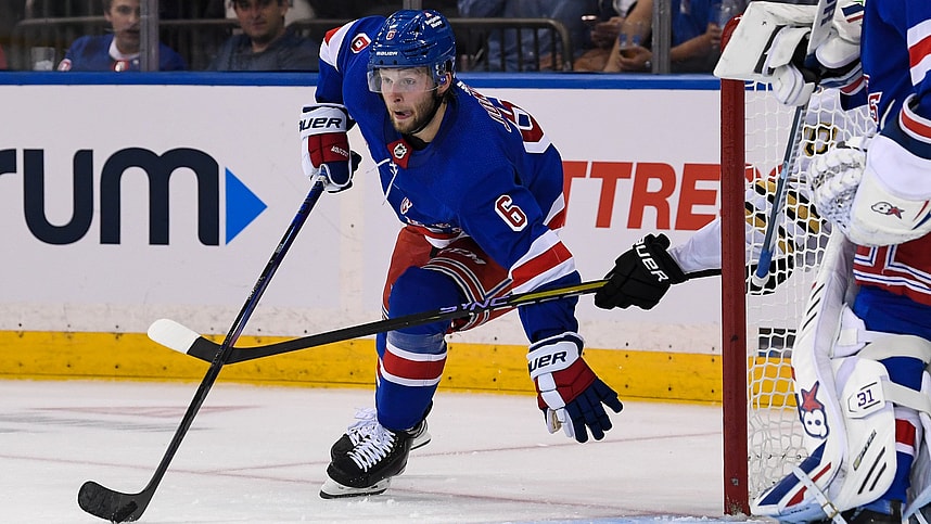New York Rangers defenseman Zac Jones (6) skates with the puck from behind the net against the Boston Bruins during the second at Madison Square Garden