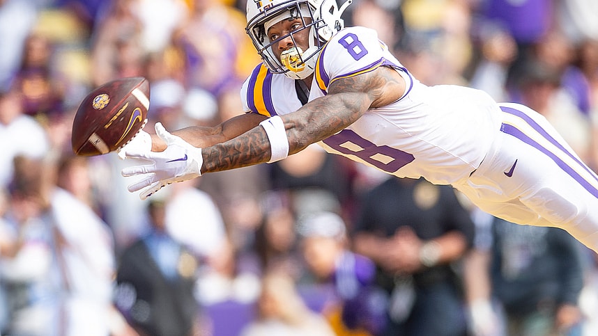 Malik Nabers (New York Giants prospect) 8 dives for a ball as the LSU Tigers take on Texas A&M in Tiger Stadium in Baton Rouge, Louisiana, November 25, 2023.