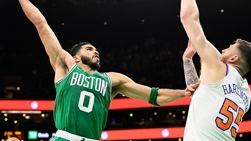 Boston Celtics forward Jayson Tatum (0)  shoots over New York Knicks center Isaiah Hartenstein (55) during the second half at TD Garden