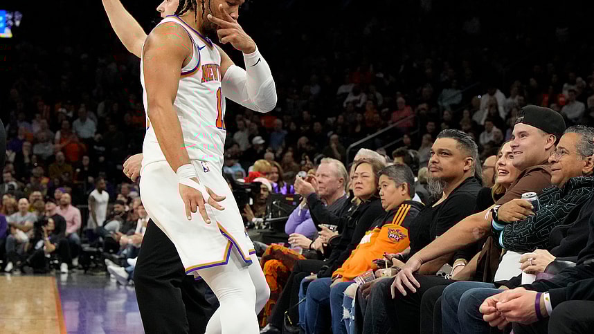 New York Knicks guard Jalen Brunson (11) rects after scoring against the Phoenix Suns in the second half at Footprint Center